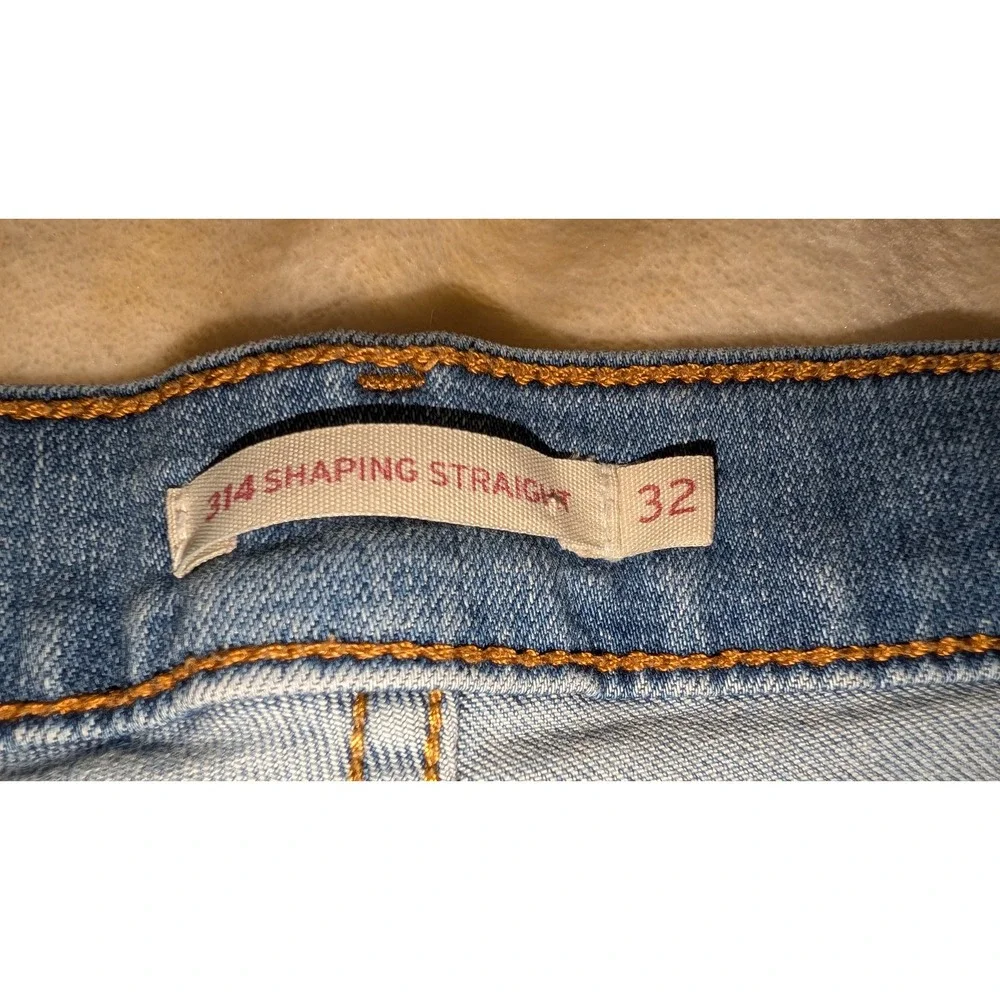 Levis 314 Shaping Straight Jeans Womens 32 Medium Wash Blue Distressed Denim